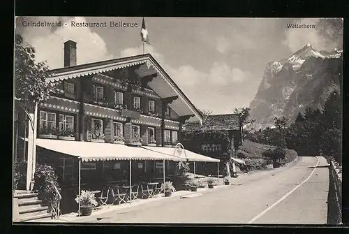 AK Grindelwald, Strassenpartie mit Resturant Bellevue und Wetterhorn