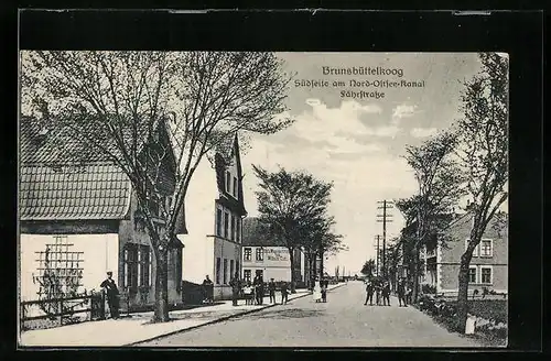 AK Brunsbüttelkoog, Südseite am Nord-Ostsee-Kanal Fährstrasse mit Hufe Wagenschmiede von Wilhelm Todt