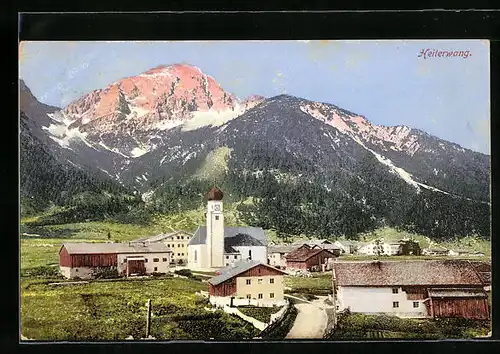 AK Heiterwang, Blick auf das malerische Örtchen und die Berge