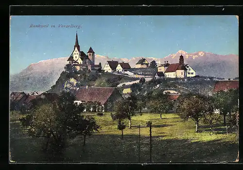 AK Rankweil, Blick zwischen Bäumen hindurch auf den Ort