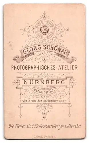 Fotografie Georg Schönau, Nürnberg, Junger Mann mit langem Schnurrbart