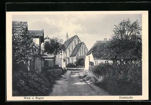 AK Wiek a. Rügen, Dorfsftrasse mit Kirche