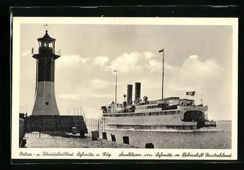 AK Sassnitz a. Rüg., Leuchtturm mit Fährschiff Deutschland