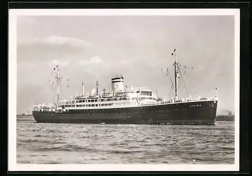 AK Doppelschrauben-Motorschiff Caribia in See stechend