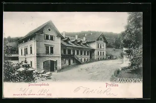 AK Preblau, Strassenpartie mit Directionsgebäude