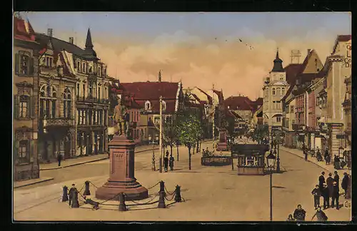 AK Offenburg, Marktplatz mit Geschäften und Denkmälern