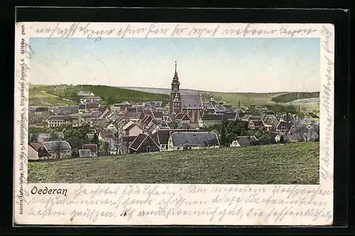 AK Oederan, Teilansicht von einem Feld aus, mit leuchtenden Fenstern