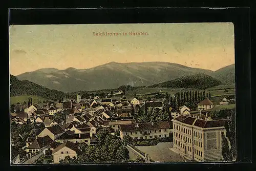AK Feldkirchen, Blick auf die Dächer mit Berglandschaft im Hintergrund