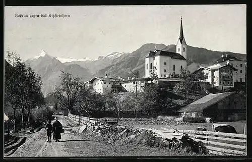 AK Kaprun, Ortspartie mit Kirche gegen das Kitzsteinhorn