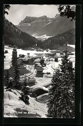 AK Lech am Arlberg, Teilansicht mit Kirche im Winter