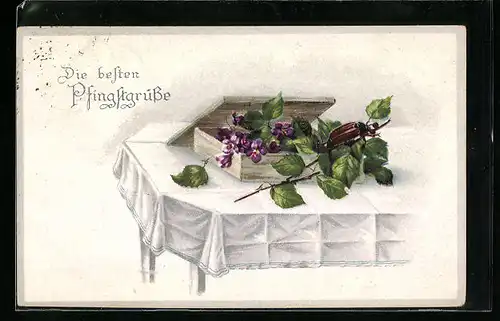 Künstler-AK Maikäfer und Zigarrenkiste mit Blättern auf einem Tisch, Pfingstgruss