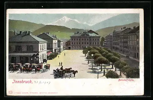 AK Innsbruck, Bahnhofsplatz mit Kutschen