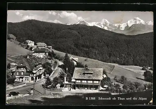 AK Schwendi ob Thun, Ortsansicht mit den Alpen