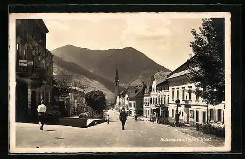 AK Rottenmann, Partie in der Unteren Stadt mit Blick auf Kirche und Berge