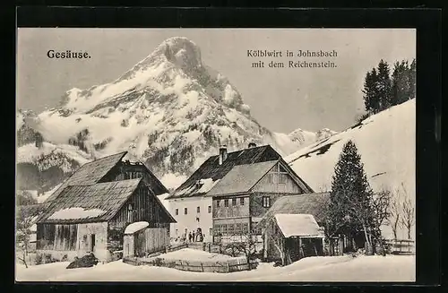 AK Johnsbach, Gasthaus Kölblwirt mit dem Reichenstein im Winter