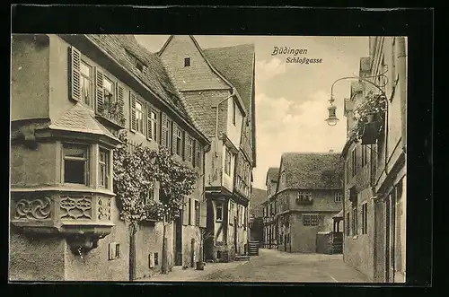 AK Büdingen, Strasse Schlossgasse mit Fachwerkhaus