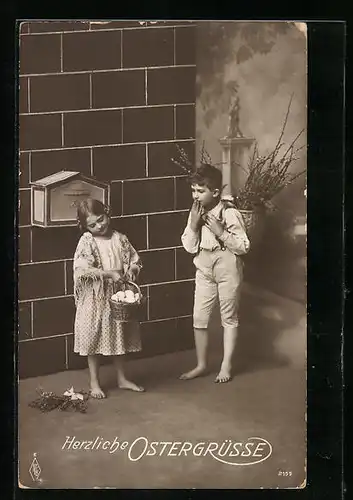 AK Mädchen mit Osterkorb vor einem Briefkasten