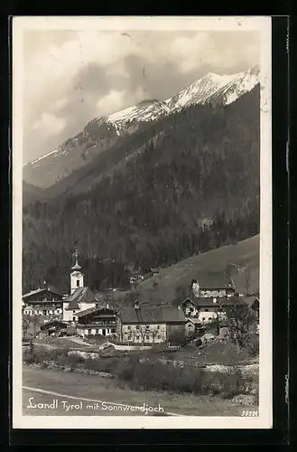 AK Landl, Ortspartie mit Kirche und Sonnwendjoch