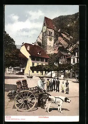 AK Interlaken, Mann mit Karren und Zughund vor einer Kirche