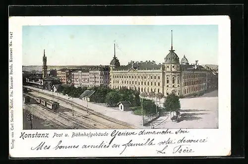 Goldfenster-AK Konstanz, Post und Bahnhofgebäude mit leuchtenden Fenstern