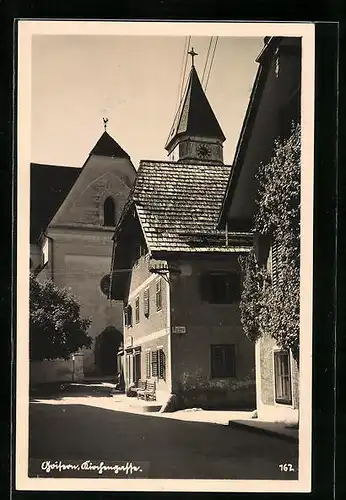 AK Goisern, Strasse Kirchengasse mit Kirche