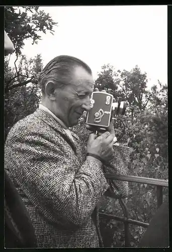 Fotografie Mann mit Film-Kamera während des filmens fotografiert