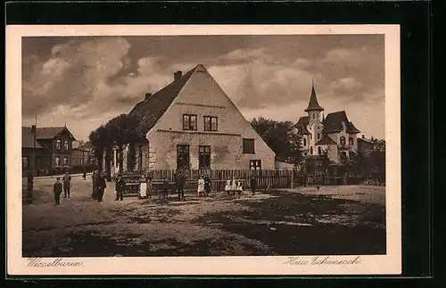 AK Wesselburen, Strassenpartie mit Haus Eckenesch und Villa mit Turm