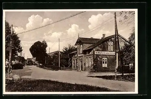 AK Heidekamp, Ansicht der Gastwirtschaft u. Kolonialwarenhandlung Heinrich Wulf
