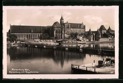 AK Marienburg /Wpr., Marienburg mit Nogatbrücke