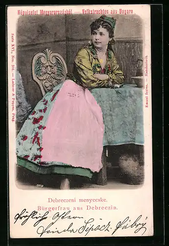 AK Debreczin, Bürgerfrau an einem Tisch sitzend