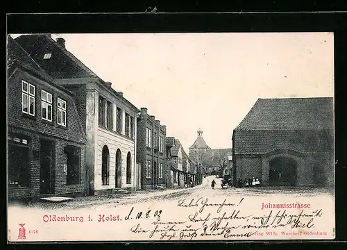 AK Oldenburg i. H., Partie in der Johannisstrasse mit Blick auf die Kirche