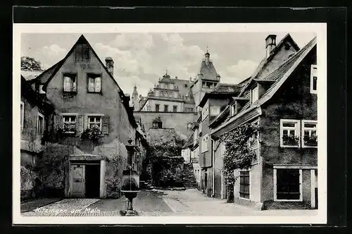 AK Kitzingen a. M., Häuseransichten mit Brunnen