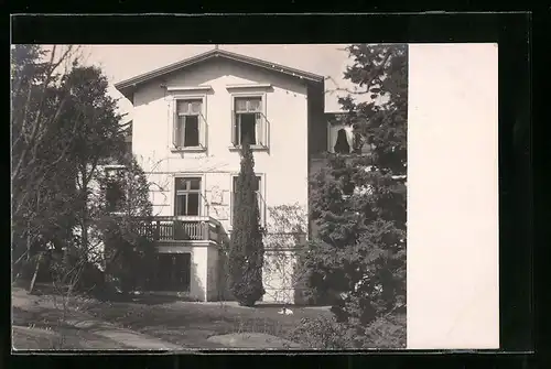 Foto-AK Malente-Gremsmühlen, Ortspartie mit Gebäudeansicht