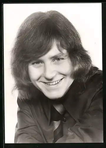 AK Musiker Hans-Jürgen Beyer mit strahlendem Lächeln