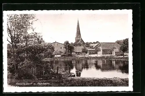 AK Petersdorf a. Fehmarn, Partie am See mit Blick auf die Kirche