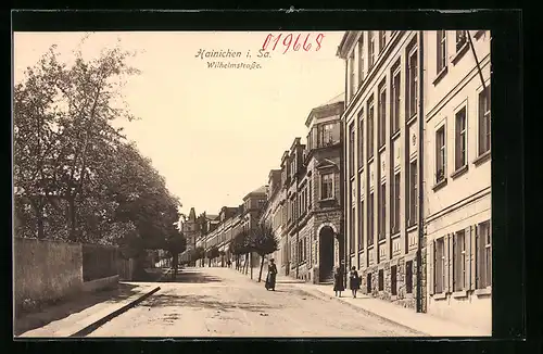 AK Hainichen i. Sa., Wilhelmstrasse mit Zigarrengeschäft