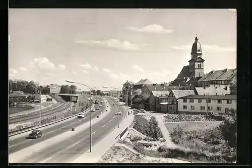 AK Waren /Müritz, Strassenpartie an der Eisenbahn und Kirche