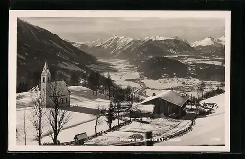 AK Mösern bei Seefeld, Talblick mit Kirche im Schnee