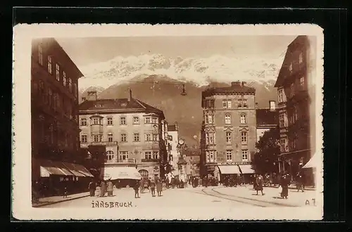 AK Innsbruck, Strassenpartie mit Bank und Geschäften