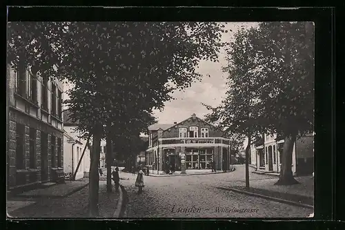AK Lunden, Blick in die Wilhelmstrasse mit Warenhandlung
