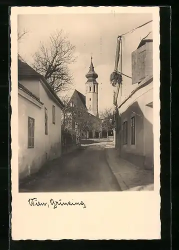 AK Wien-Grinzing, Strassenpartie mit Kirche
