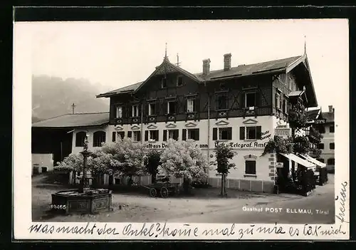 AK Ellmau, Gasthof Post mit Vorplatz und Springbrunnen