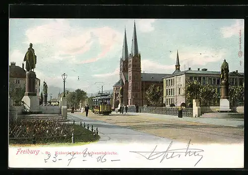 AK Freiburg i. Br., Strassenbahn auf der Kaiserbrücke mit Johanniskirche