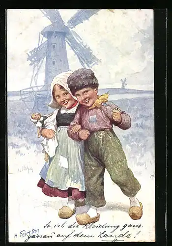 Künstler-AK Karl Feiertag: Niederländische Kinder in ihrer Tracht vor einer Windmühle