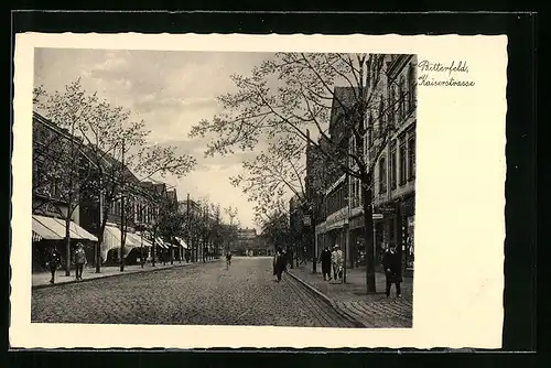 AK Bitterfeld, Kaiserstrasse mit Geschäften