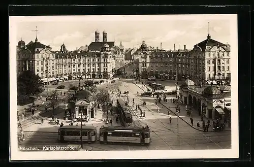 AK München, Karlsplatzrondell mit Geschäften und Strassenbahn