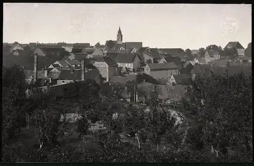 Fotografie Brück & Sohn Meissen, Ansicht Mutzschen i. Sa., Blick auf die Stadt mit Kirchturm