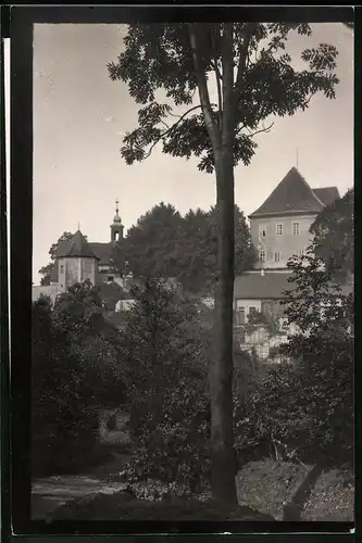 Fotografie Brück & Sohn Meissen, Ansicht Mutzschen i. Sa., Partie im Ort mit Kirchturm