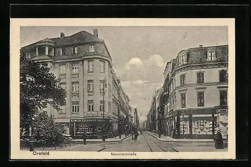 AK Crefeld, Geschäfte in der Neusserstrasse, Litfasssäule