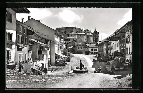 AK Gruyères, Strassenpartie mit Geschäften